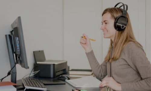 Teletherapist speaking with student online